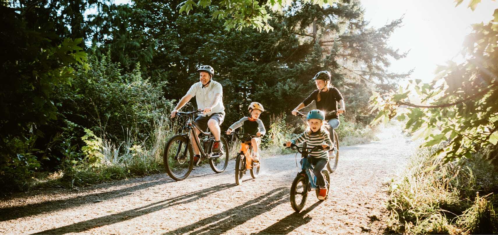 A family taking a bike ride together