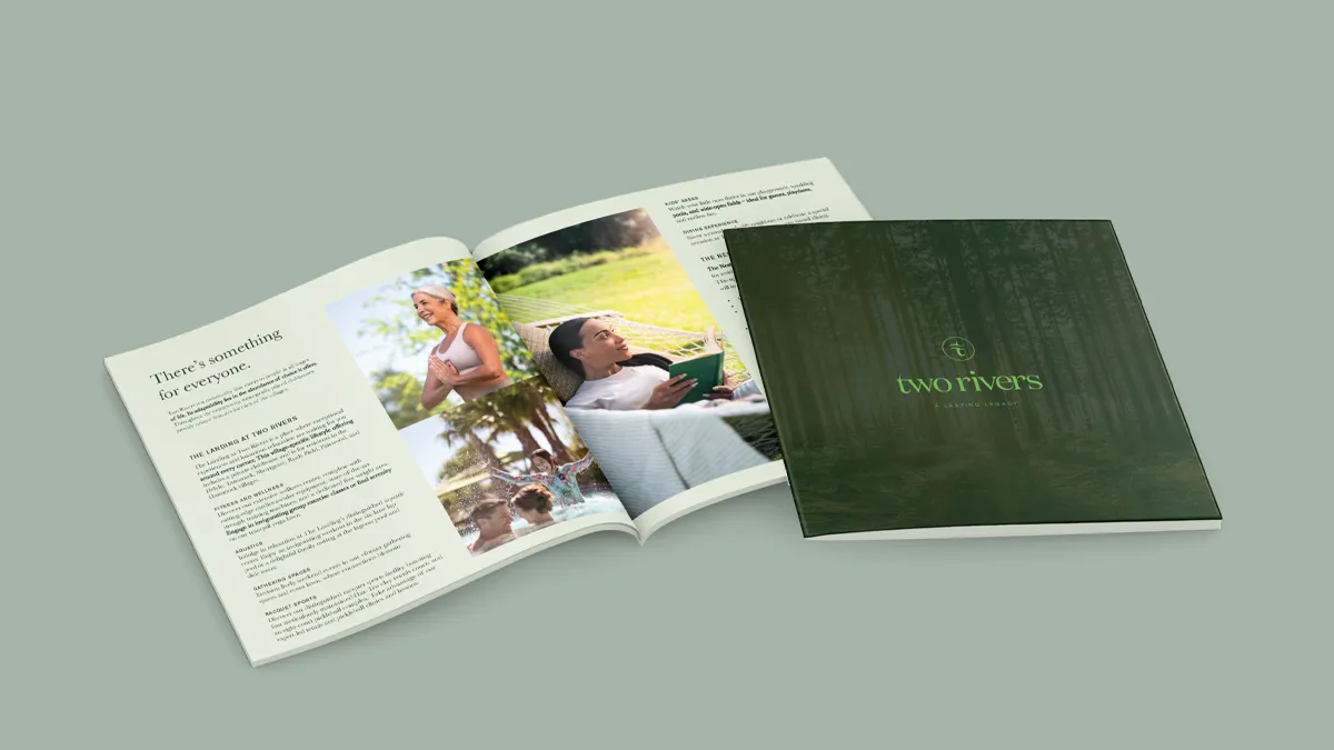 An open brochure and a closed brochure for tworivers are displayed on a light green surface. The open brochure shows text and photos of people enjoying outdoor activities in nature. The closed cover features a forest background.