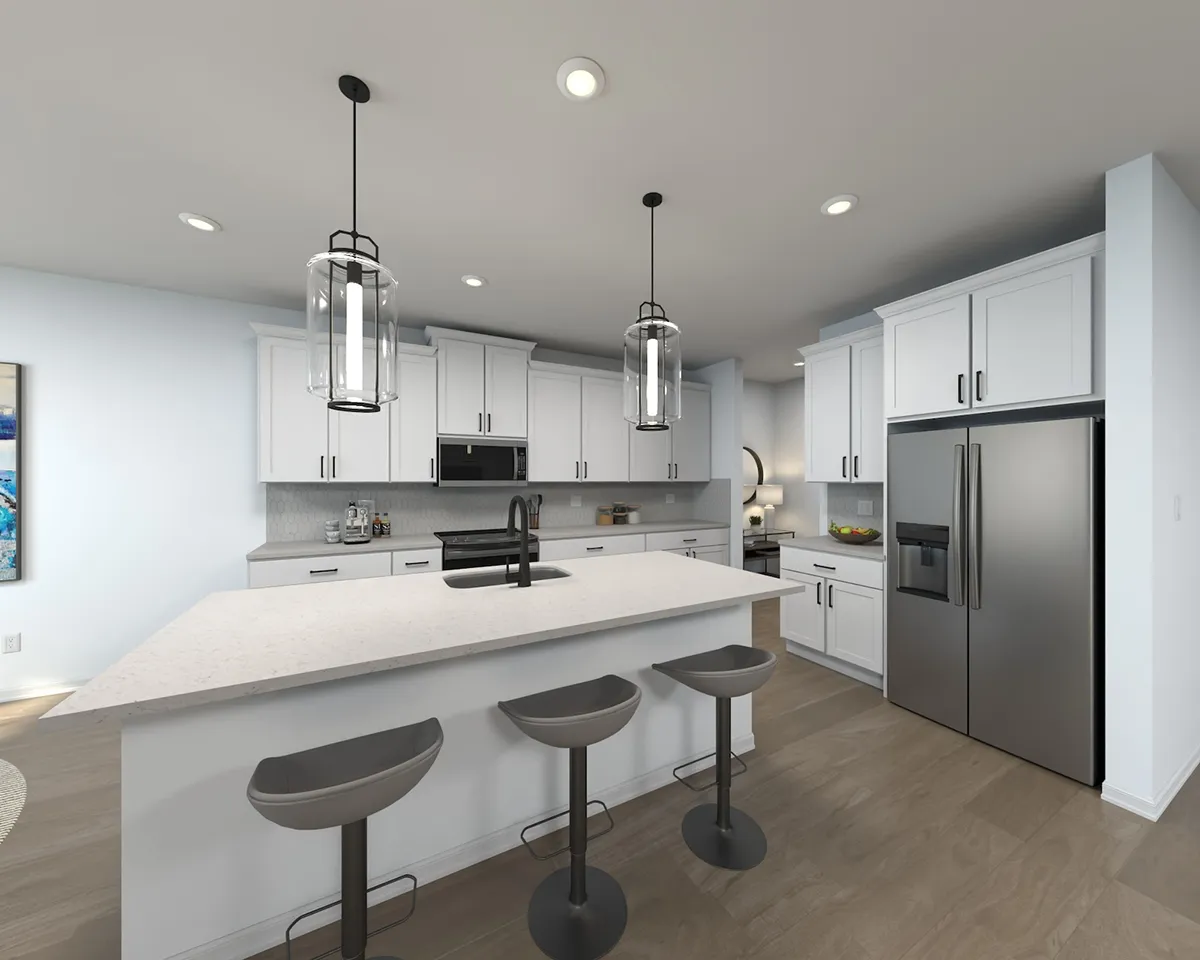 Modern kitchen with white cabinets, stainless steel appliances, a large island with a white countertop, three gray barstools, pendant lights above the island, and wood flooring.