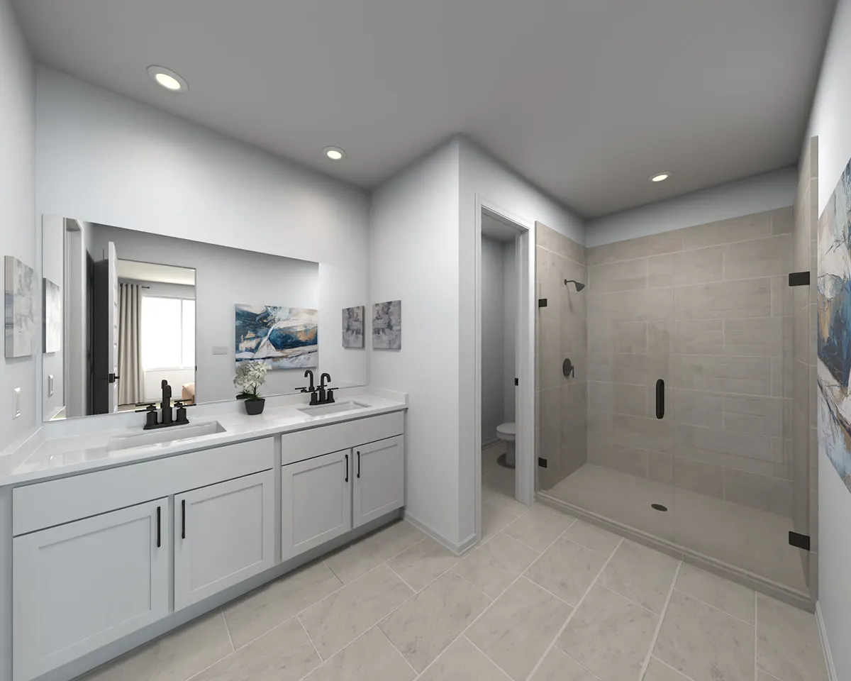 Modern bathroom with double sink vanity, black fixtures, large framed mirror, walk-in glass shower, light beige tile floor, white cabinets, and abstract artwork on the walls.
