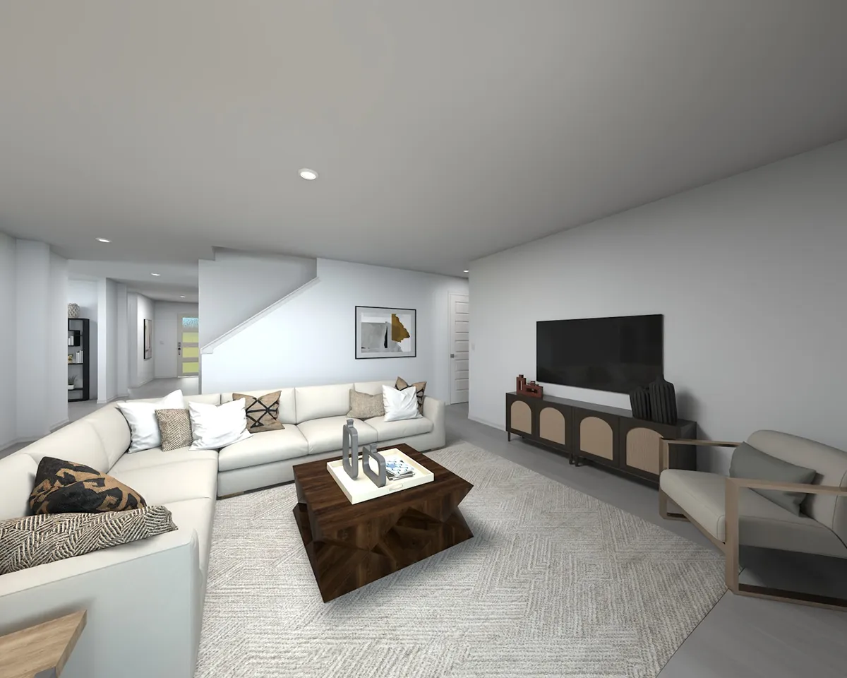 A modern living room with a large white sectional sofa, a wooden coffee table, a TV on a console, an armchair, decorative pillows, a rug, and minimalistic wall art. The space is bright with neutral tones.