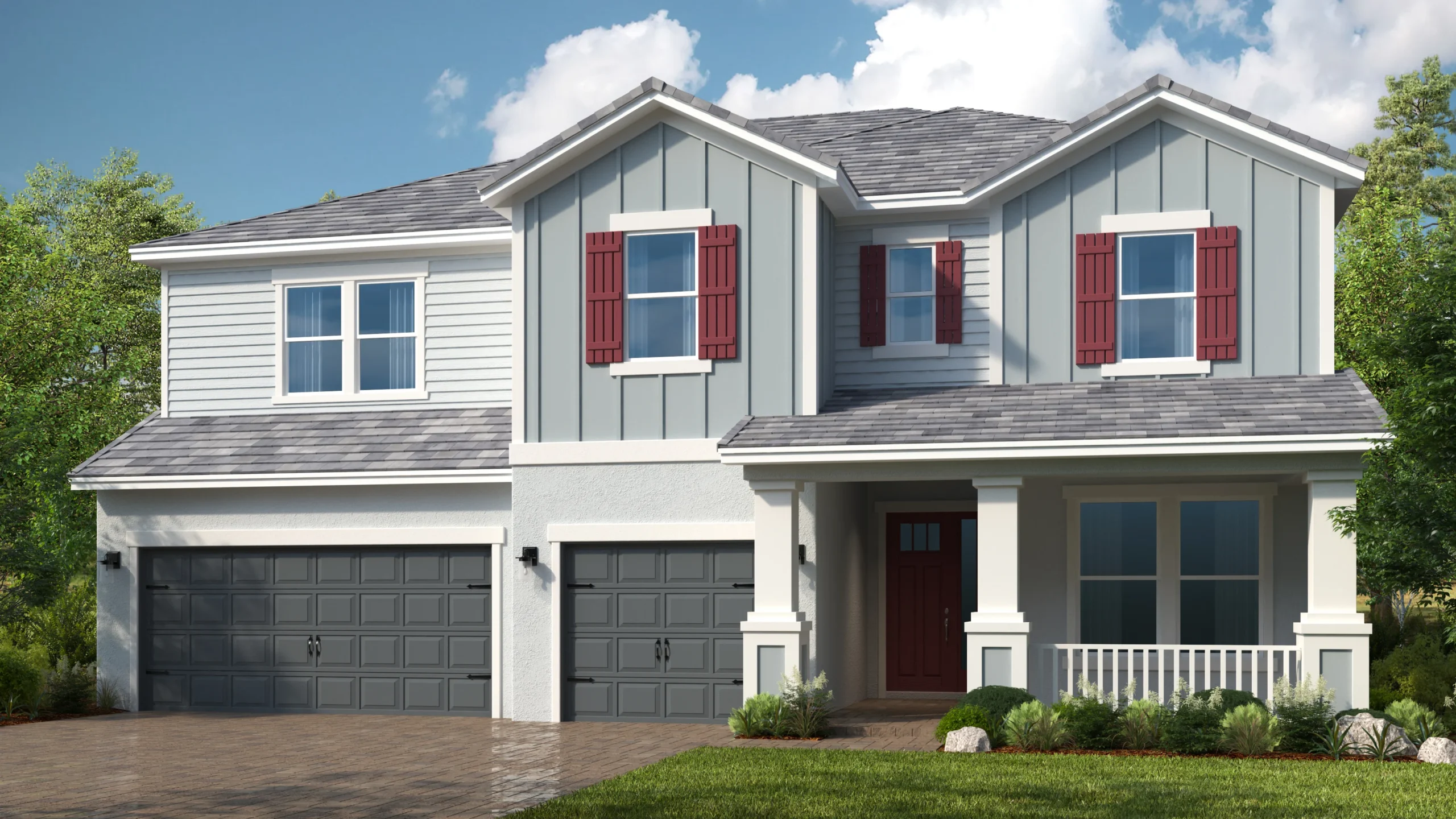Two-story modern suburban house with gray siding, red shutters, a red front door, three-car garage, covered front porch, and a well-kept lawn under a partly cloudy sky.