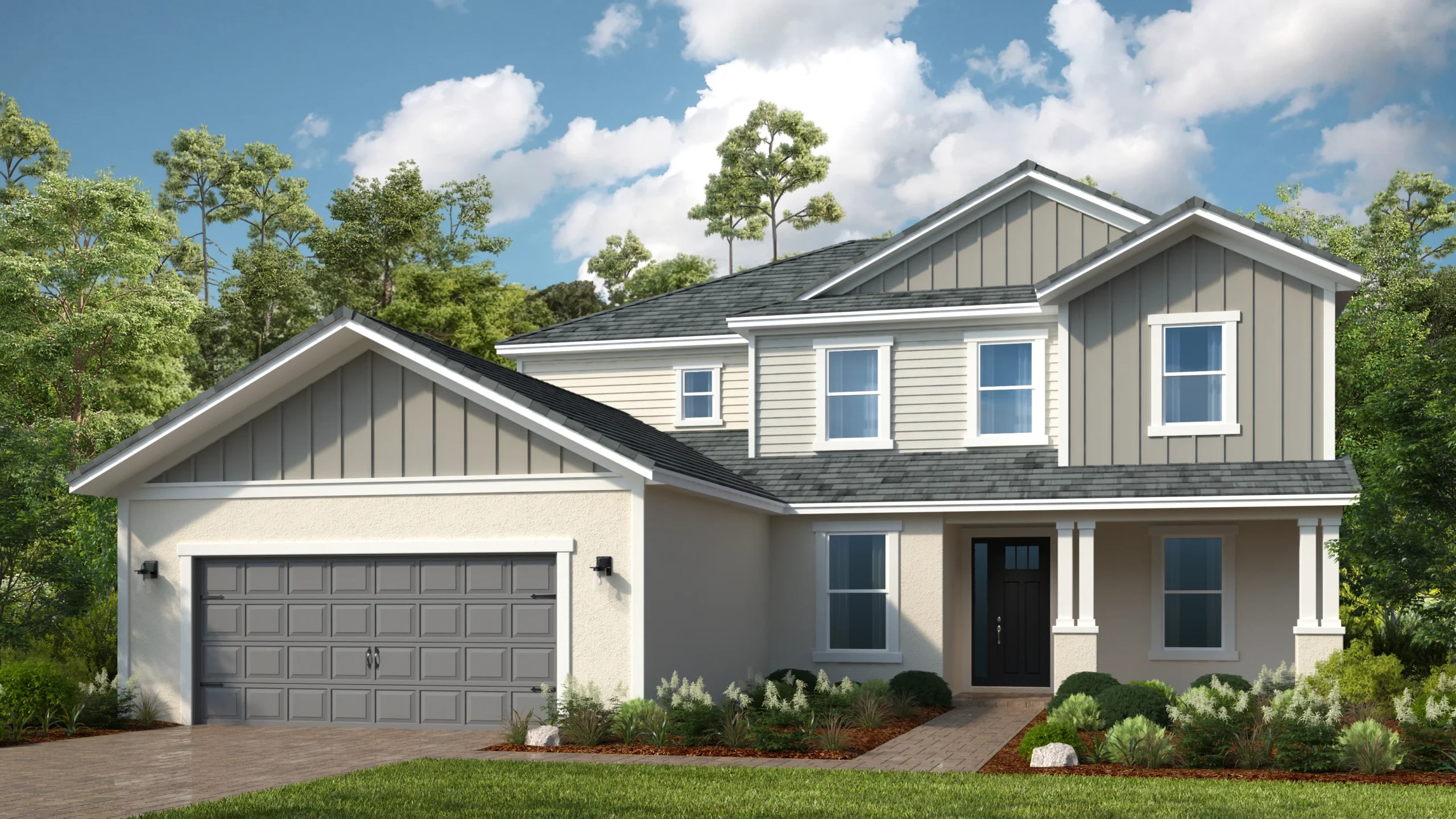Two-story suburban house with gray siding and white trim, a double garage, dark front door, and landscaped yard, set against a backdrop of trees and a partly cloudy sky.