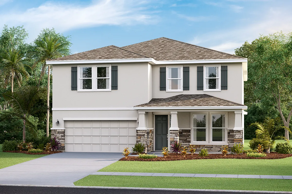 Two-story suburban house with a gray shingle roof, white exterior, dark shutters, and stone accents. There is a double garage, small front porch, and landscaped yard with grass, bushes, and trees.