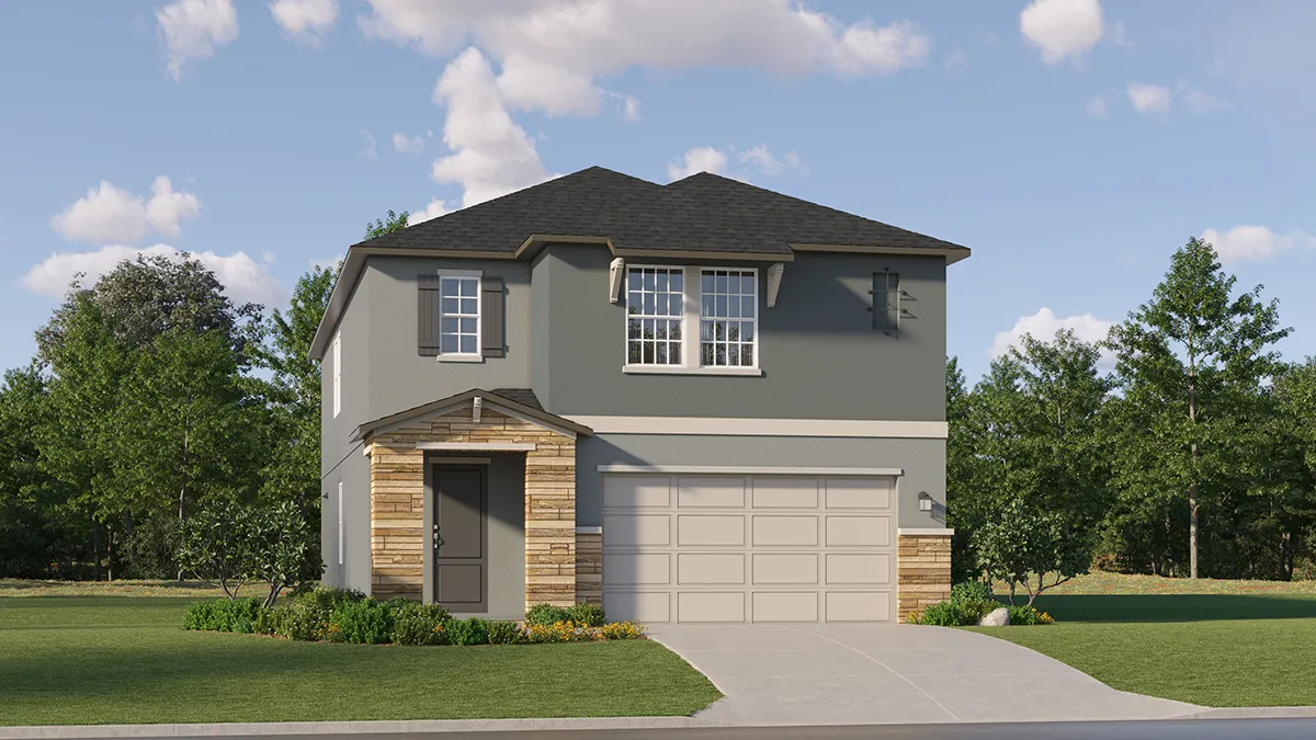 A modern two-story house with gray exterior walls, stone accents, a two-car garage, and a covered front porch. The house is surrounded by grass, shrubs, and trees under a blue sky with scattered clouds.