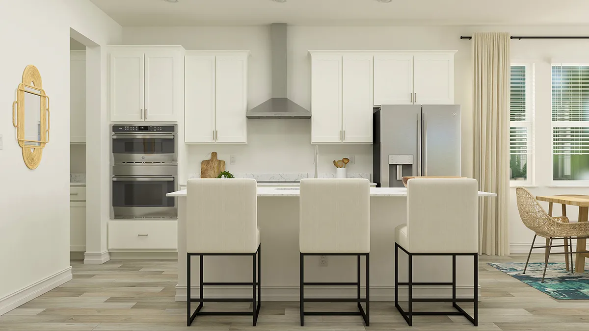 Modern kitchen with white cabinets, stainless steel appliances, a large island with three cream-colored bar stools, wood flooring, and dining area with a table and chairs near large windows with beige curtains.