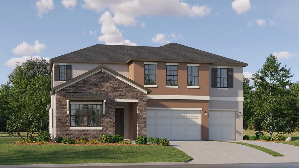 A modern two-story suburban house with stone and beige siding, multiple large windows, and a three-car garage, surrounded by green lawn and trees under a partly cloudy sky.