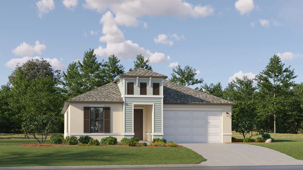Single-story suburban house with light-colored exterior, small front porch, two-car garage, and landscaped yard, set against a backdrop of green trees and a partly cloudy sky.