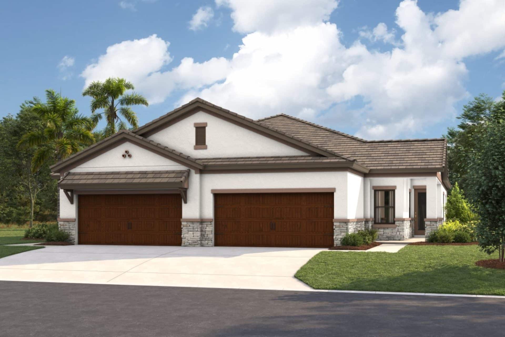 A modern, single-story house with a white exterior, stone accents, brown roof, and three wooden garage doors. The driveway is wide, and there is green landscaping with trees and grass under a partly cloudy sky.