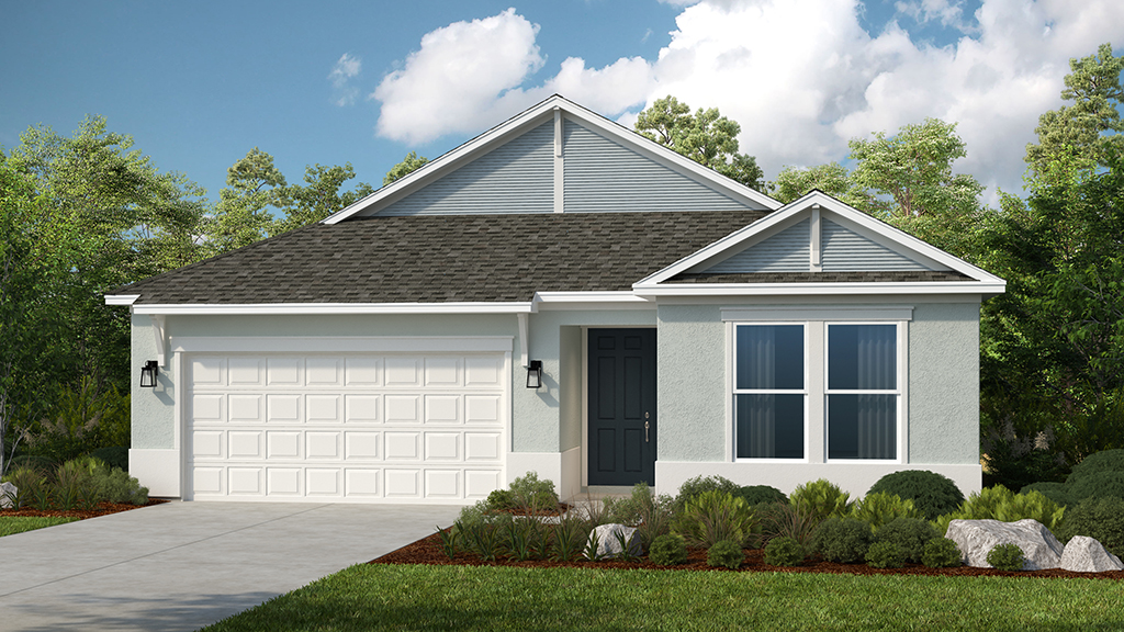 A modern single-story house with gray siding, white trim, a dark gray shingle roof, and a two-car garage. There are three front windows, a black front door, and neatly landscaped shrubs and grass in the front yard.