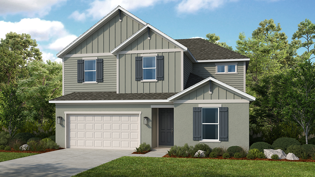Two-story suburban house with gray siding, dark shutters, and a white double garage. The home has a manicured lawn, shrubs, and trees in the background under a blue sky with scattered clouds.