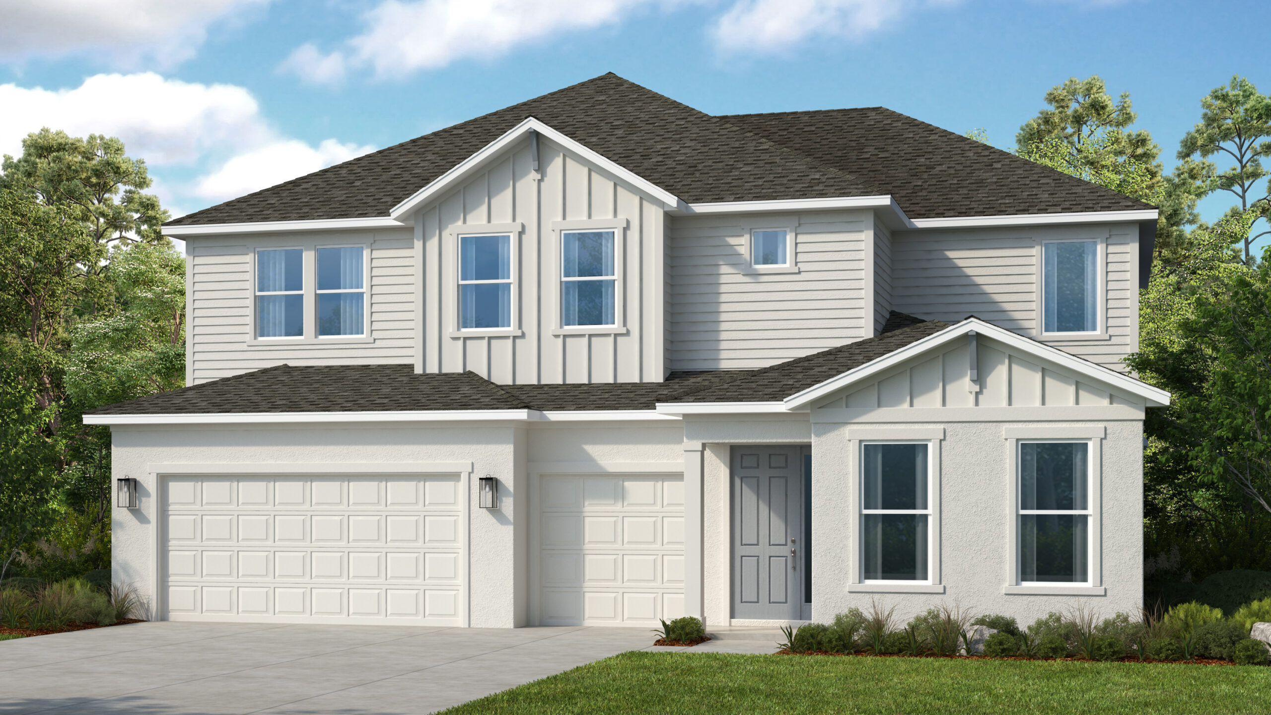 Modern two-story house with light-colored siding and a dark shingle roof, featuring three garage doors, several large windows, a front door with side panel, and minimal landscaping in front. Trees and blue sky in the background.